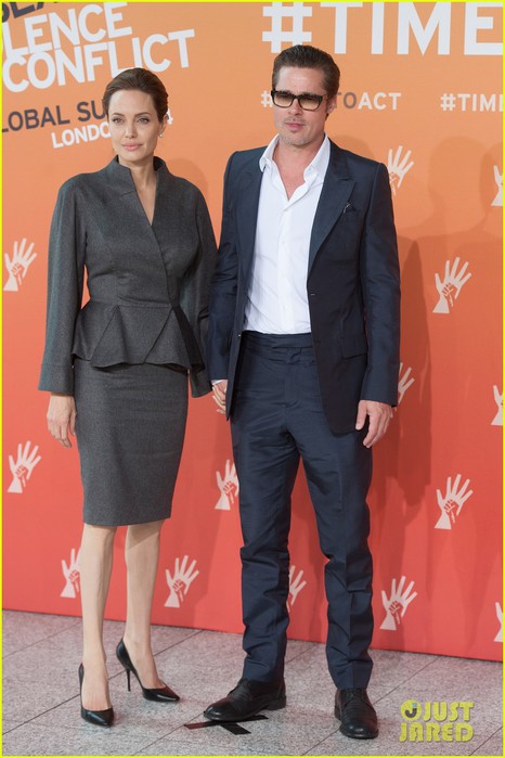angelina-jolie-brad-pitt-keep-hand-in-hand-at-the-global-summit-end-sexual-violence-07 (466x700, 78Kb)