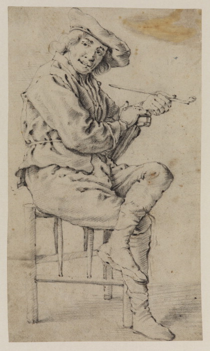 Young man seated with a pipe (419x700, 79Kb)