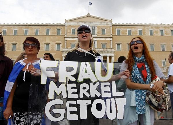 Массовые протесты против визита Ангелы Меркель