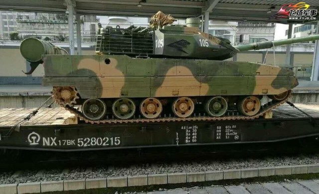 tank-tip-15-na-zheleznodorozhnoi-platforme-mashina-neset-uzhe-znakomuyu-nam-emblemu--doqxx5k4-1612335541.t (640x389, 188Kb)