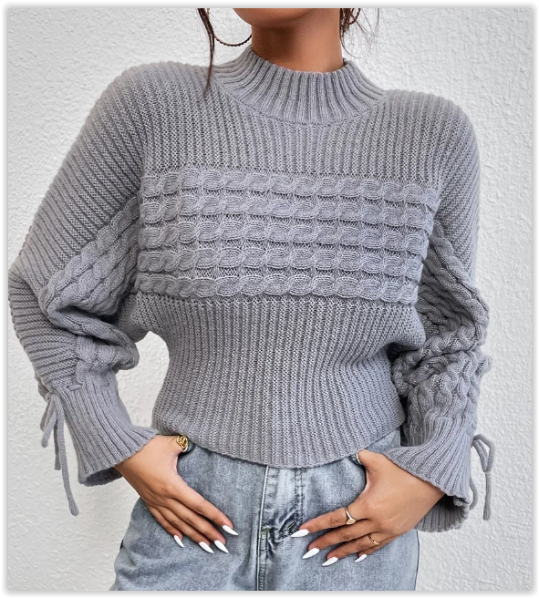 Летний пуловер, связанный поперек волнистым узором