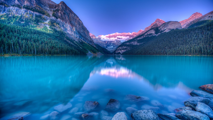 Suns glow over the glacier, Lake Louise sunrise, Alberta, Canada (700x393, 319Kb)