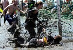 Мад Олимпийские игры (Mud Olympics) в устье реки Эльбы недалеко от Гамбурга, 6 июня 2010 года.