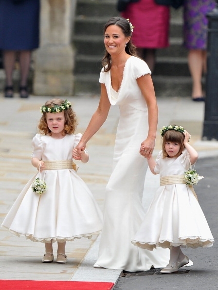 LONDON, ENGLAND - APRIL 29:  Sister of the bride and Maid of Honour Pippa Middleton holds hands with Grace Van Cutsem and Eliza Lopes as they arrive to attend the Royal Wedding of Prince William to Catherine Middleton at Westminster Abbey on April 29, 201