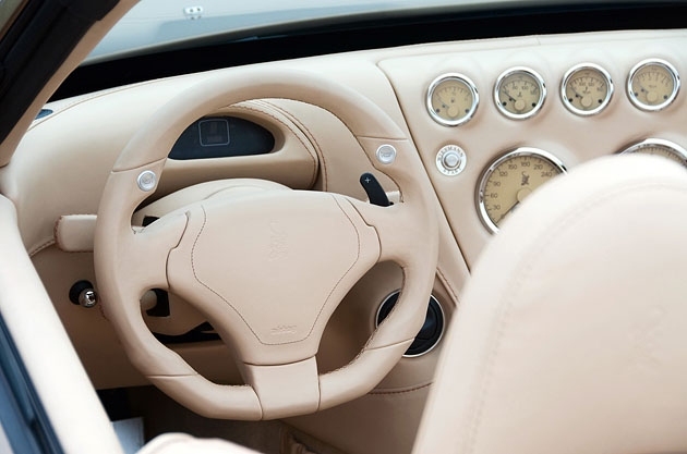 Inside, GT MF5 as in earlier models present chrome switches and buttons, rounded dashboard in sporty style.  All the trim is made by hand.  Such interior details like leather and fabric are selected based on personal preferences