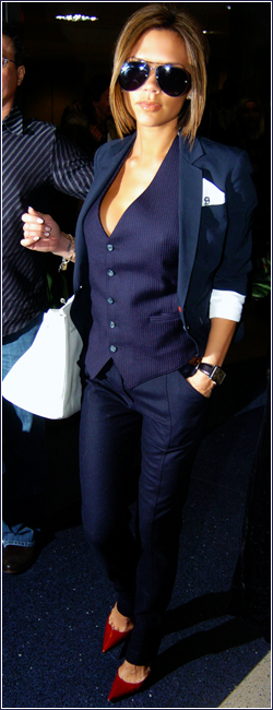 13735391_123mike_Victoria_Beckham_arriving_at_Lax_airport_051 (250x650, 161Kb)