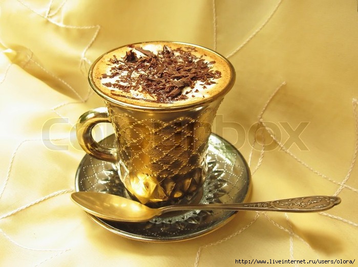 2232131-cup-of-aromatic-coffee-with-coffee-with-ice-cream-and-chocolate-on-a-yellow-background (600x422, 201Kb)