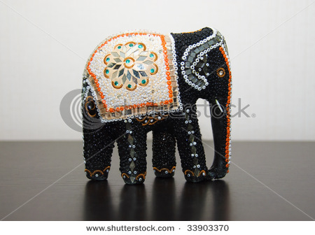 stock-photo-closeup-photo-of-elefant-toy-over-gray-33903370 (450x336, 55Kb)