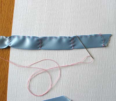 blue ribbon flower stitched (400x347, 44Kb)