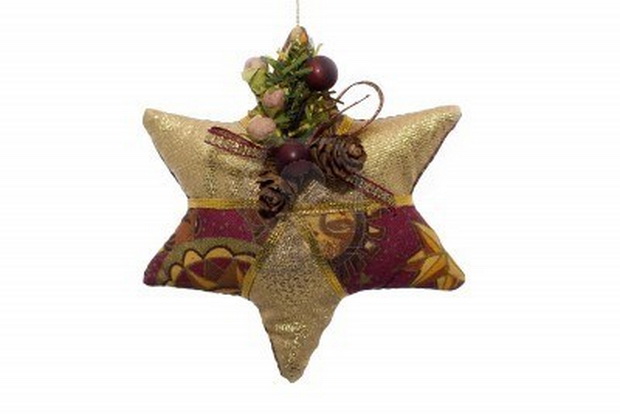 1789730-a-fabric-christmas-ornament-shaped-like-a-star-on-a-white-background (620x414, 47Kb)