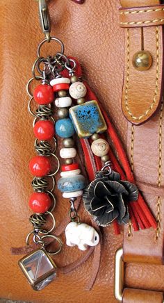 6226115_69b7f464fd1703e1459ae9d80d49aaf9borlakeychains (236x436, 30Kb)
