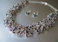 6226115_b83b5c31a8db78bc44141f1a50cfa820crochetearringscrochetbracelet_1_ (236x174, 9Kb)