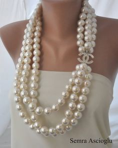 6226115_dca9ed58bc8ab690610fff9a30f29054chanelnecklacechanelpearls (236x295, 10Kb)