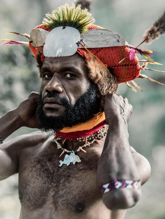 Колоритные папуасы и традиция шрамов из Папуа Новой Гвинеи