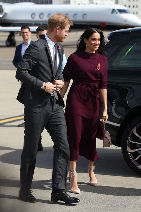 britains-prince-harry-and-his-wife-meghan-duchess-of-sussex-news-photo-1054465564-1540821999 (445x700, 51Kb)