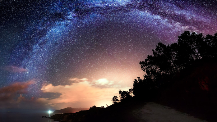 Milky way arch over the sea and the trees in Galicia, Spain (700x393, 316Kb)