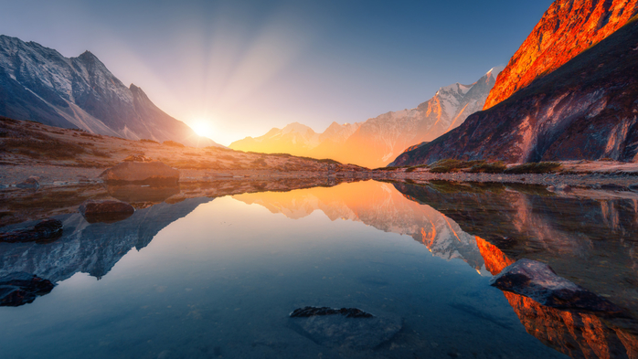 Mountain landscape with illuminated peaks and lake at sunrise, Himalayas, Nepal (700x393, 337Kb)