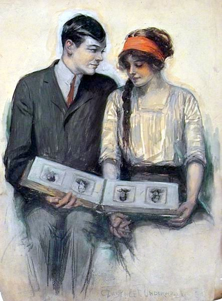 young-couple-looking-at-photo-album (443x600, 176Kb)